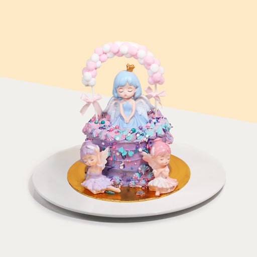 Purple cake with angelic figurines
