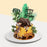 Jungle themed cake with an Elephant, Giraffe and Tiger figurine