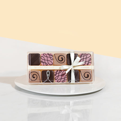 Tarts filled with raspberry chocolate, hazelnut, dark chocolate, and dark chocolate with almonds