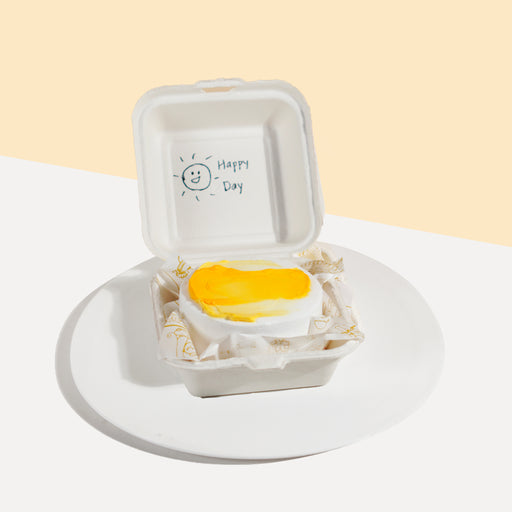 Korean yellow bento/ lunchbox cake with yellow buttercream