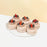 Mini chocolate pavlovas with chocolate buttercream, topped with fresh fruits