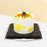 Mango and passion fruit butter cake, topped with passion fruit puree