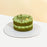 Matcha butter cake, with green tea ganache, topped with a pool of matcha sauce