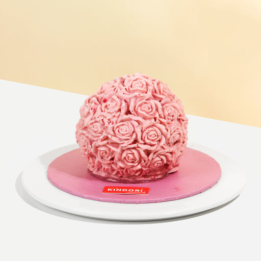 Strawberry ice cream cake shaped into a ball of roses