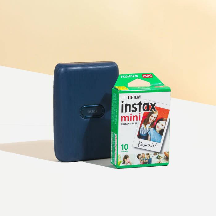 Instax Mini Link (Dark denim) beside a box of Instax mini film