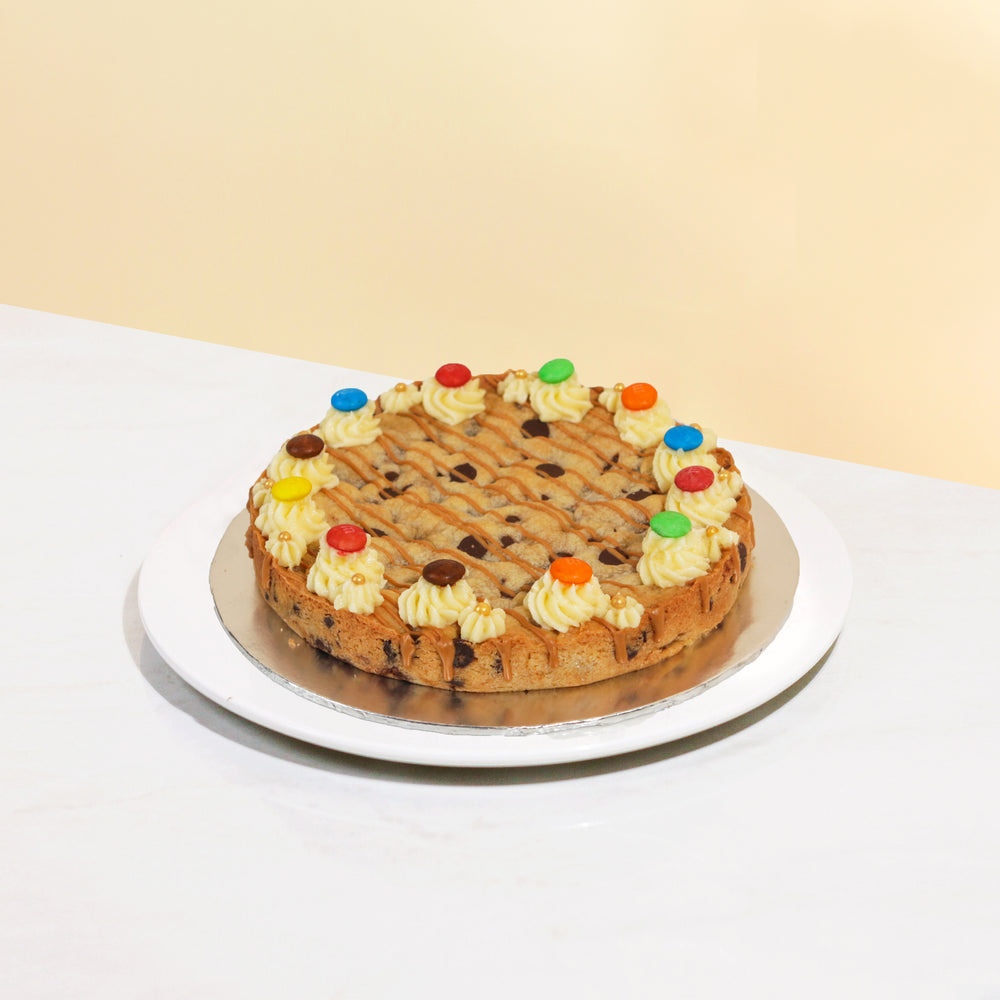 Cookie cake, topped with caramel drizzle