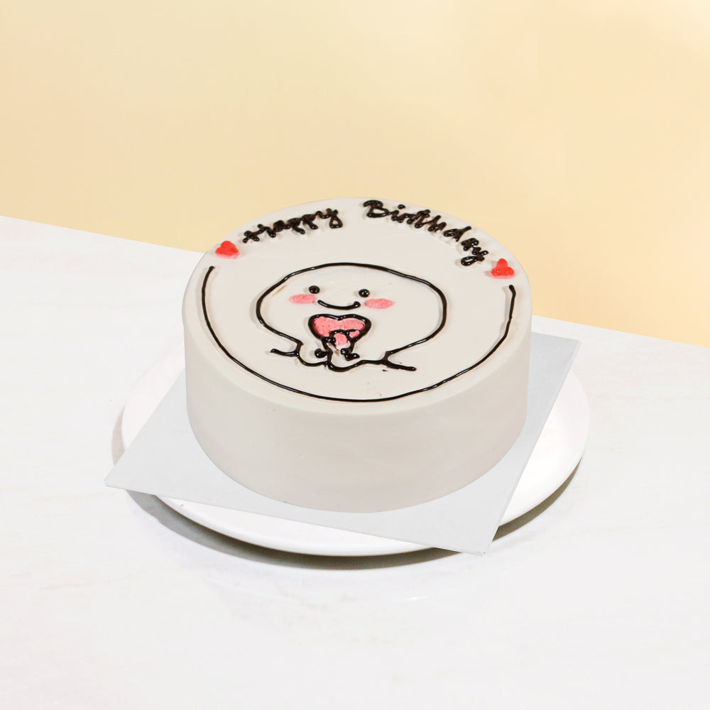 Emoji cake with finger heart