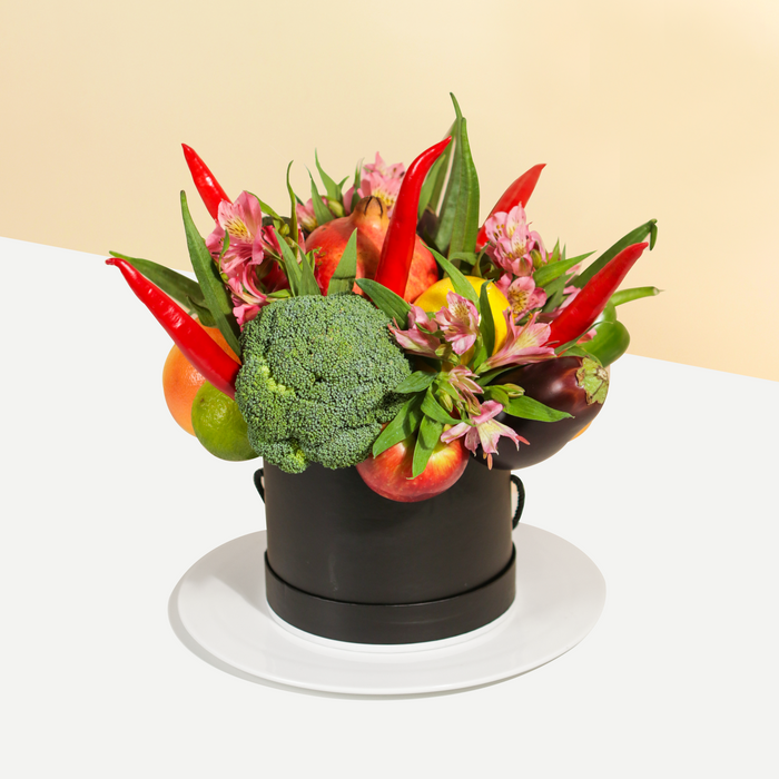 Black box bouquet with alstroemeria flowers, vegetables and fruits