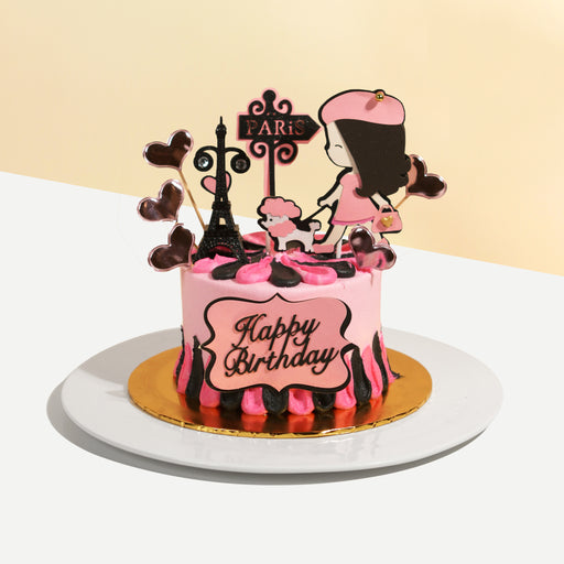 Pink butter cake, decorated in a Parisian theme