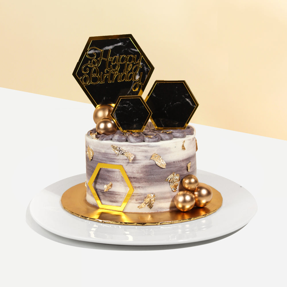 Buttercream cake with Hexagonal decorations