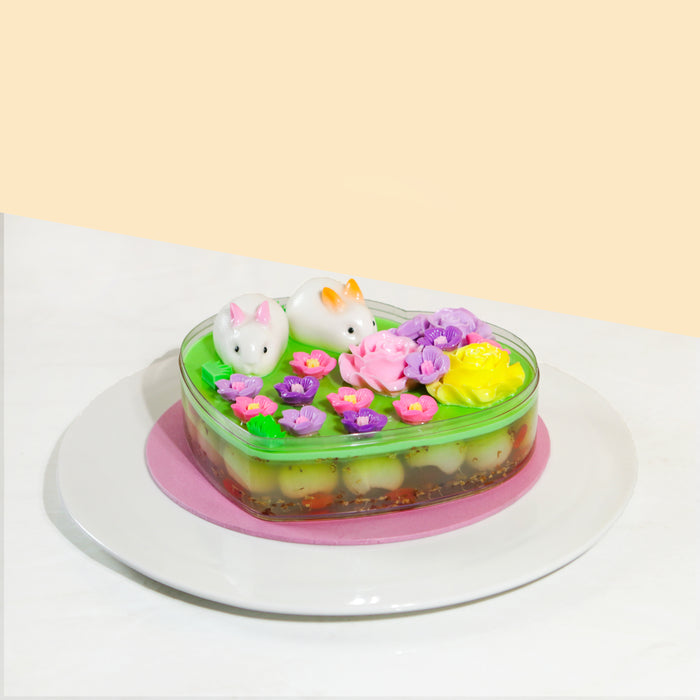 Rabbit garden jelly cake with longans, goji berries and osmanthus, with edible jelly flowers and rabbits