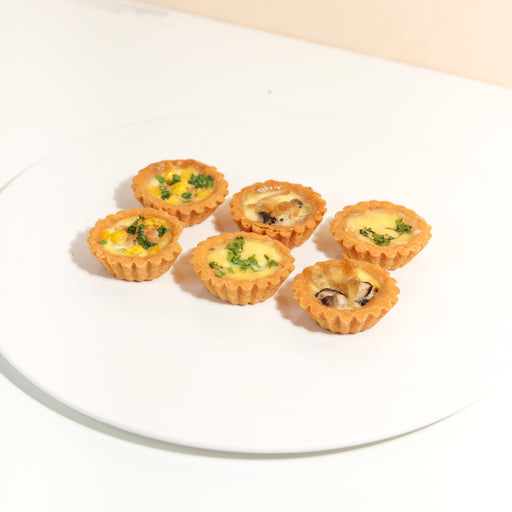 Mini assorted savoury tarts with 3 different fillings