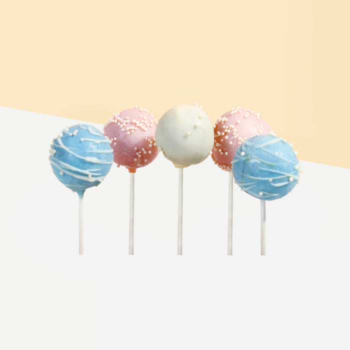 Cake pops with lolipop stems, in blue, pink and white