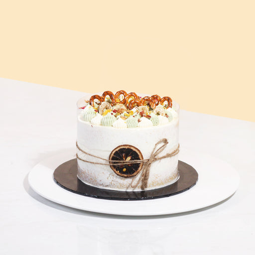 Japanese matcha vegan cake topped with pretzels