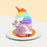 Colorful cake with unicorn design elements