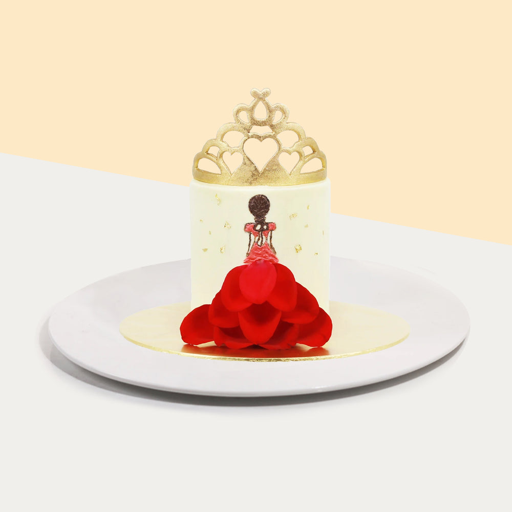 Cake with a lady with 3d red dress design, topped with a golden crown