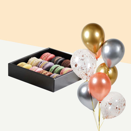 Elevete Patisserie Macaron Box of 12 with a bundle of balloons