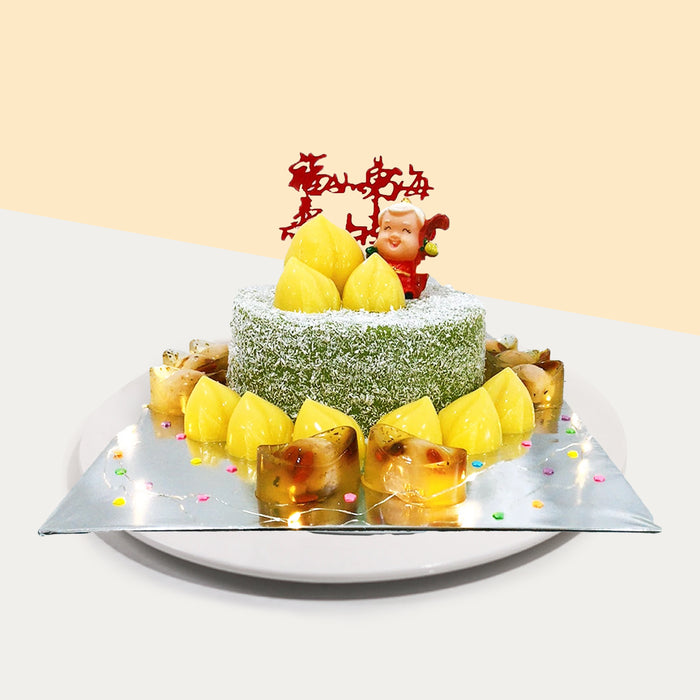 Pandan layer cake with coconut flakes, with golden peach jellies and osmanthus jelly ingots