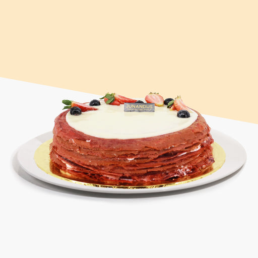 Red velvet mille crepe with cream cheese layers