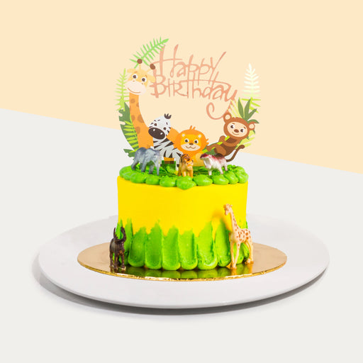 Yellow and green buttercream cake, decorated with 3d nd 2d printed animals