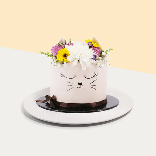 Cat faced cake, decorated with fresh flowers