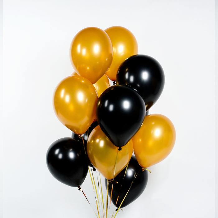 Metallic gold and black balloons